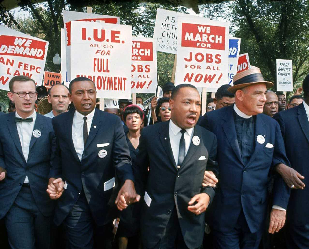 Martin Luther King, Jr. and others marching for jobs and justice.
