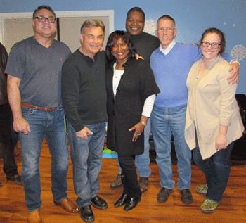 Left to right: Julio Cruz, Rick Rizzs, Solid Ground Residential Services Director Dee Hillis, Dave Henderson, Bill &amp; Sarah King