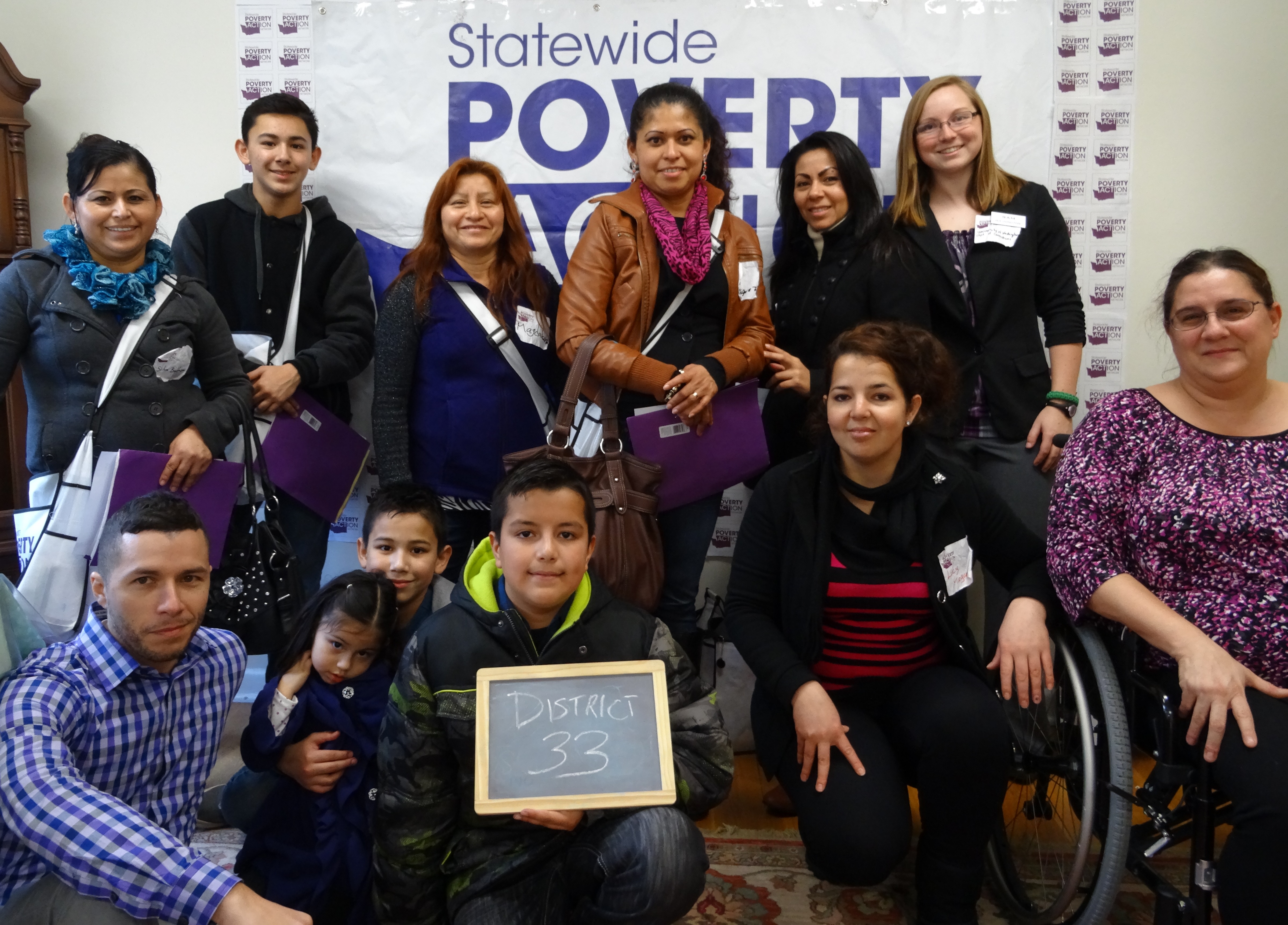 Members of District 33 at Poverty Action’s Activist Space photobooth.