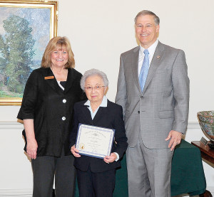 Sue Fujino with Governor Jay Inslee & First Lady Trudy Inslee (Photo courtesy of the Governor’s Office)