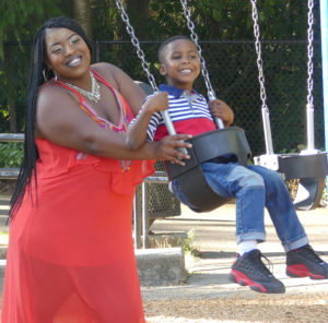 Ashley & Marcus, swinging high (photo by Liz Reed Hawk)