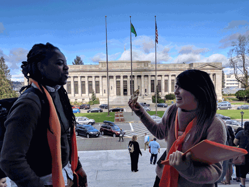 Meagan Howard of El Centro de la Raza and Charlene Hsia of Solid Ground's Food System Support get ready to meet legislators for Hunger Advocacy Day.