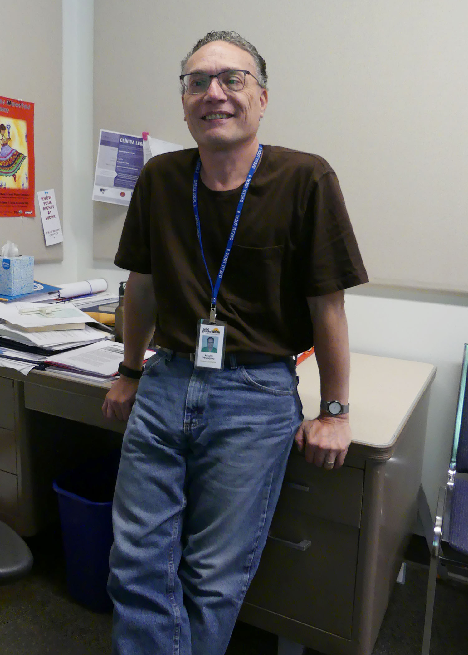 Arturo at his desk in Solid Ground's Tenant Services