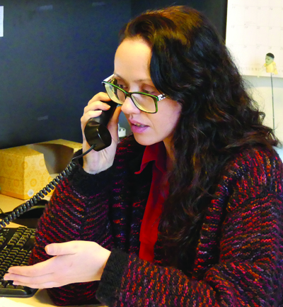 Lead Benefits Attorney Stephanie Earhart consults with a client
