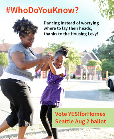 Mom and daughter dancing at Sand Point Housing