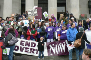 Anthony leading the 2013 March to End Poverty. (photo by Liz Reed Hawk)