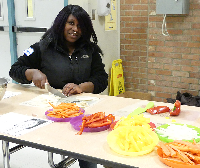 Angela safely chops veggies