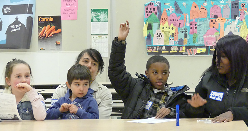Jamari raises his hand to answer a question