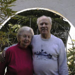 Annie & Chris outside their house
