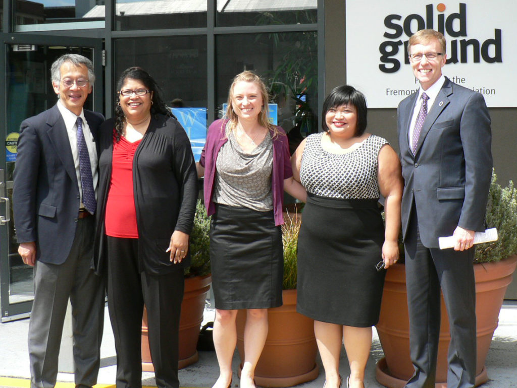 Posing after a July 20, 2012 press conference on mortgage scams