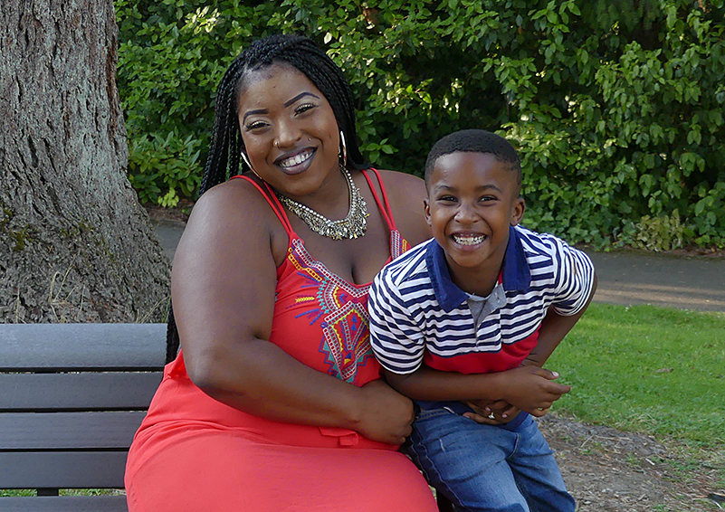 Ashley and Marcus both love their new home -- and how close it is to a really fun park! (Photo by Liz Reed Hawk)