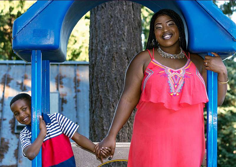 Ashley Potts with her son Marcus on a play structure at their favorite park (photo by Chris Villiers Photography)