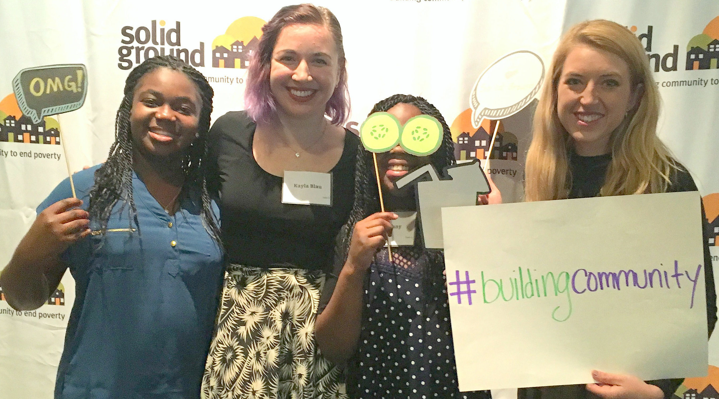 Signe being there for her poetry mentees as their work is featured at Solid Ground's 2017 Building Community Luncheon (l to r): Jennifer, Kayla (Broadview Children's Advocate), Tiffany & Signe