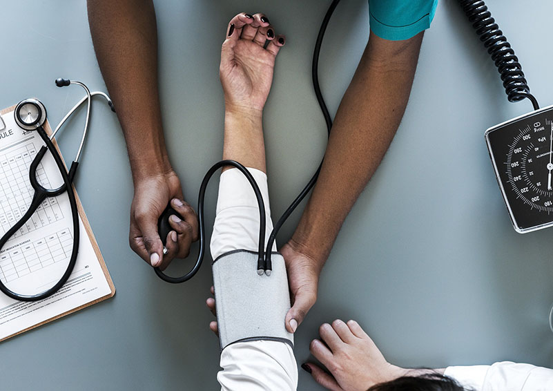 taking blood pressure