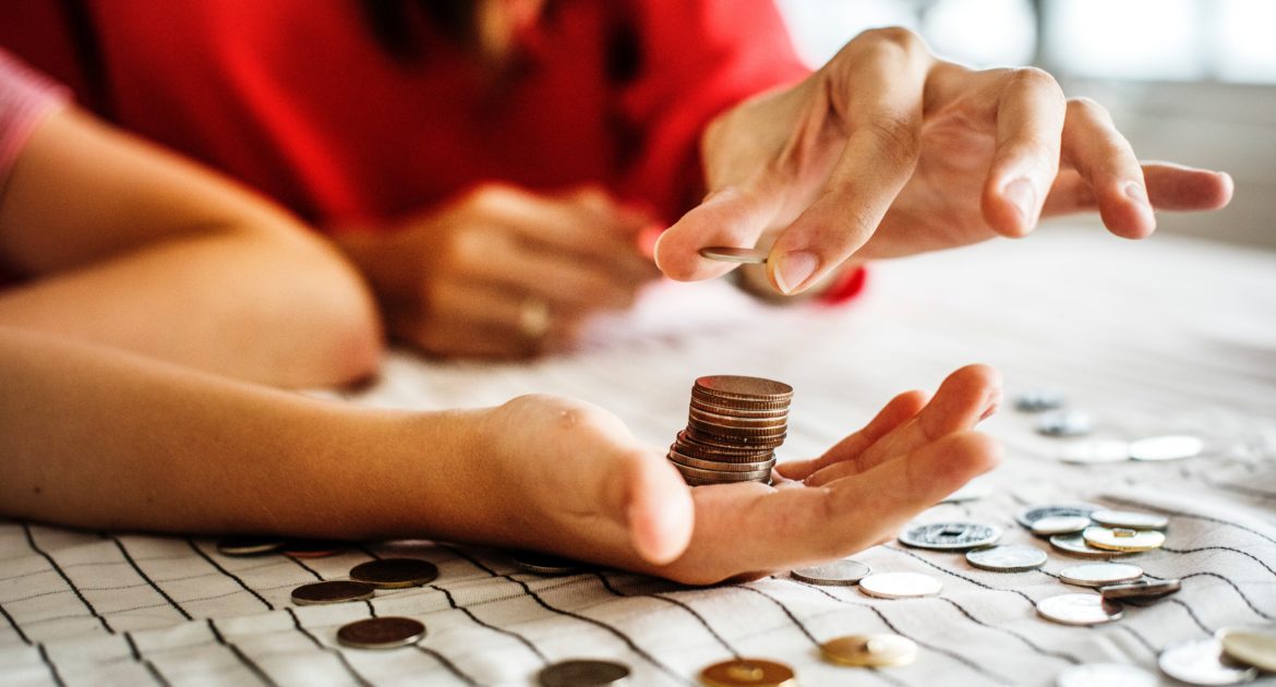 Adult hands counting coins