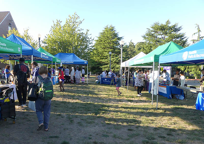 Popup tents & tables at the Sand Point community back-to-school event