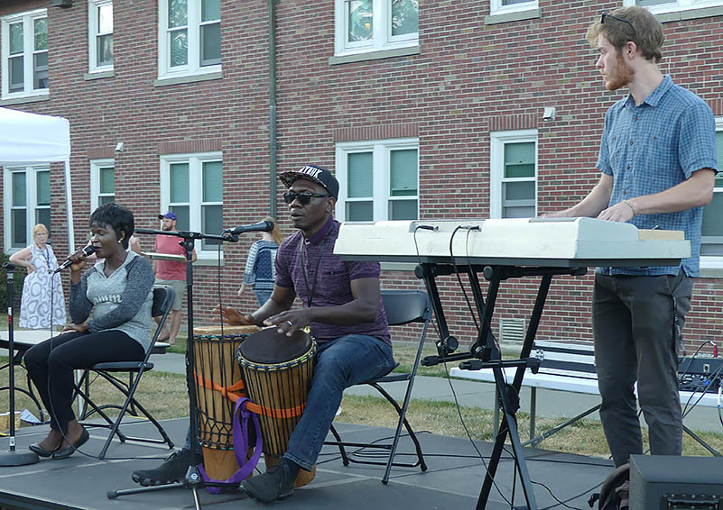 Solid Ground's house band, The Griot, plays joyful music, with Case Manager Amadanyo Oguara on drums, his wife Florence on vocals, & Grantwriter Andy Post on keyboard