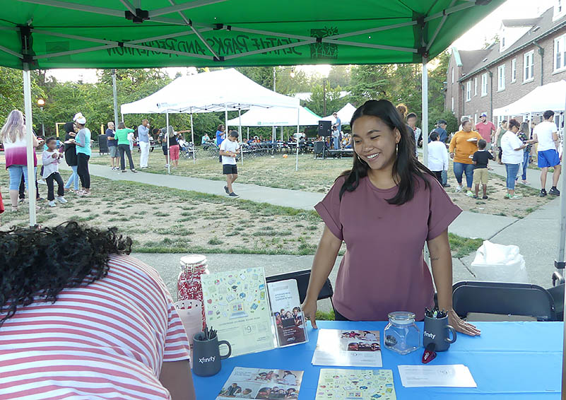 Angielene Savini, Comcast Internet Essentials Ambassador, signs up many families for high-speed internet services.