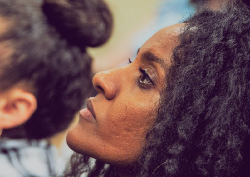 Image of woman looking attentive