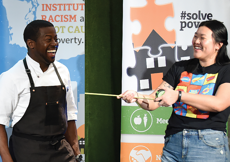 Chef Edouardo Jordan standing next to Giving Team officer Phoenica Zhang holding a measuring tape between them.