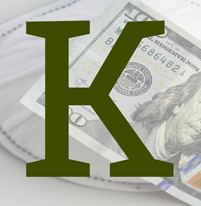 Forest green capital letter K over a $100 bill and face mask