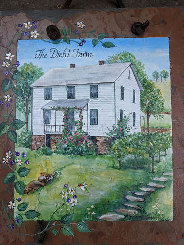 A watercolor of a farmhouse reading The Diehl Farm.