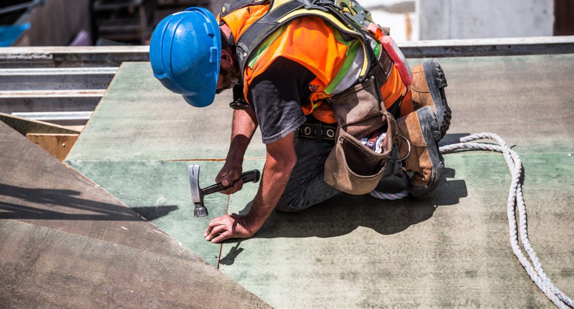 A construction worker using a hammer