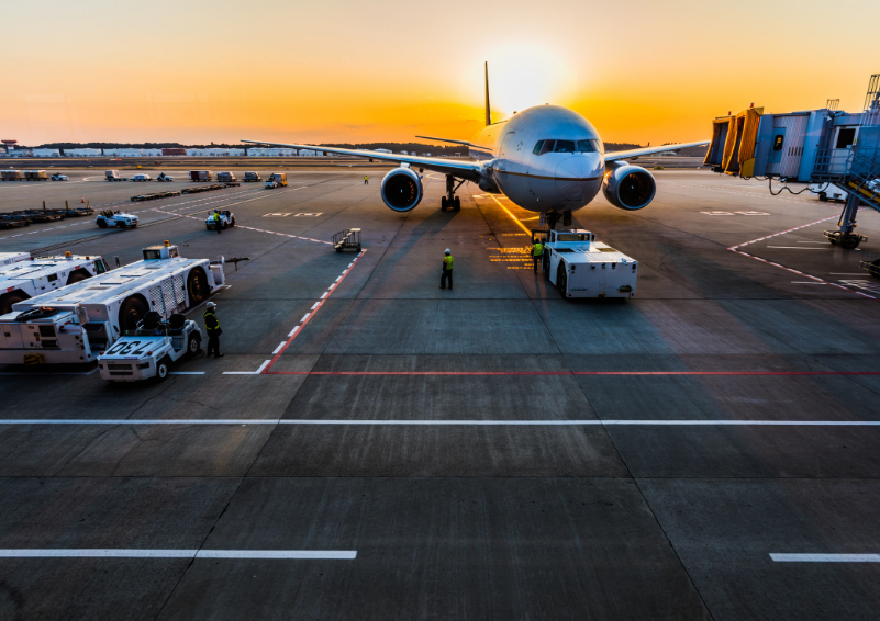 An airplane at sunrise