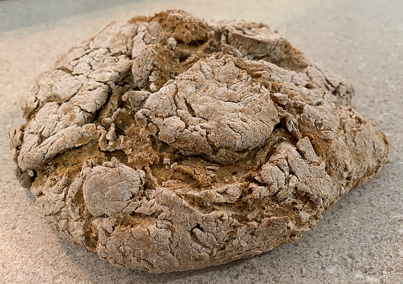 Loaf of crusty brown bread