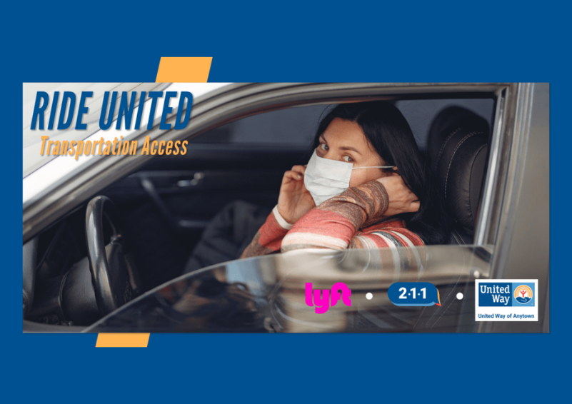 A woman in a mask behind the wheel of a car.